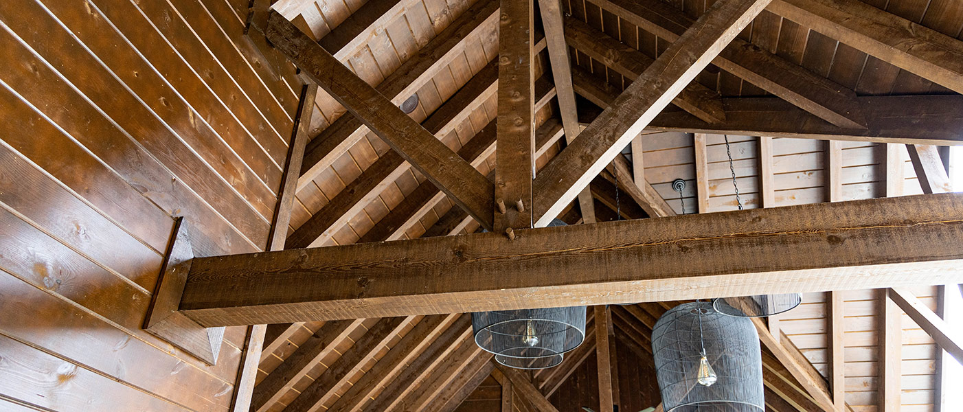 close up of large timber frame beams
