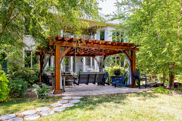 pergola with swing over a patio