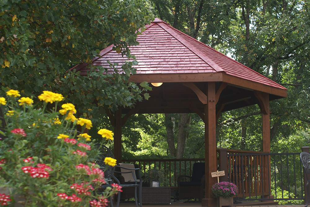 timber frame pavilion in the woods