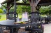 table setting under a timber frame pavilion