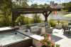 hot tub beside timber frame pavilion